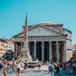 photo of people walking in front of pantheon roman temple in rome italy